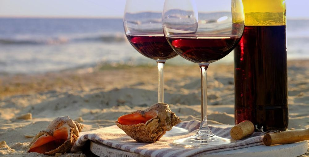 Wine and cigar on mahogany